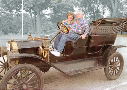 Homer and Rosemary in brass era car